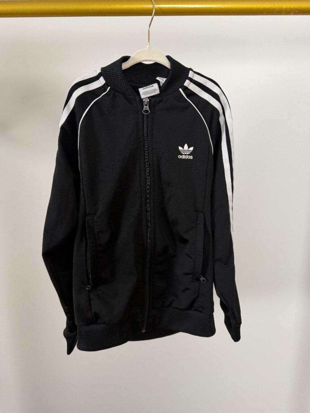 Adidas Originals Adicolor SST Track Jacket.  Black and white.  Zippered pockets.